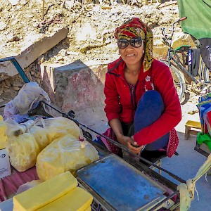 Market Trader, Nukus, Uzbekistan. I have no idea what she was selling, but like a lot of locals, she was pleased to pose for a camera.