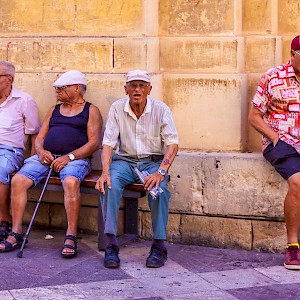 Senior Citizens taking in the sun and local flavour, Independence Street, Malta