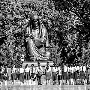 memorial in park, Taskent, Uzbekistan with party of local schoolgirls